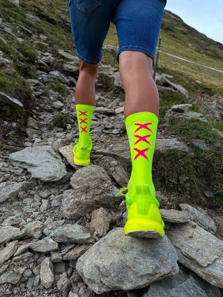 TRAIL READY 👍 Our socks are the best for cycling but working during hiking as well! And hi-visible yellow with pink logos...